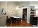 Small breakfast nook with a round table and built-in bench seating at 12826 Forestedge Cir, Orlando, FL 32828