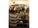 Organized closet with shelves and hanging rods at 12826 Forestedge Cir, Orlando, FL 32828