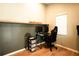 Home office with corrugated metal accent wall at 12826 Forestedge Cir, Orlando, FL 32828