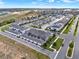 A Primary-planned community, boasting townhomes with garages and manicured landscaping at 16521 Prairie School Dr, Winter Garden, FL 34787