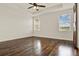 Spacious main bedroom with hardwood floors and ample natural light at 16521 Prairie School Dr, Winter Garden, FL 34787