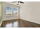Bedroom featuring hardwood floors, natural light, and neutral walls at 16521 Prairie School Dr, Winter Garden, FL 34787