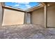 A courtyard with brick flooring and a door at 16521 Prairie School Dr, Winter Garden, FL 34787