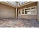 A courtyard with brick flooring and a ceiling fan at 16521 Prairie School Dr, Winter Garden, FL 34787