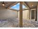 A cozy outdoor courtyard with stone flooring and a covered patio at 16521 Prairie School Dr, Winter Garden, FL 34787