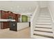Modern kitchen features dark wood cabinets, stainless steel appliances, a large island, and staircase at 16521 Prairie School Dr, Winter Garden, FL 34787