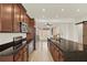 Updated kitchen boasts granite countertops and stainless steel appliances at 16521 Prairie School Dr, Winter Garden, FL 34787
