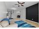 Spacious living room featuring a ceiling fan, tile flooring and access to the Kitchen at 17438 Promenade Dr, Clermont, FL 34711