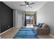 Living room with balcony access at 17438 Promenade Dr, Clermont, FL 34711