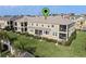 Spacious condo with private patios and lush landscaping for relaxing outdoor living at 17438 Promenade Dr, Clermont, FL 34711