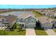 Two-story house next to a lake in a residential neighborhood at 1756 Chatsworth Cir, St Cloud, FL 34771