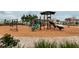 Community playground with swings, slides and a picnic structure at 1893 Sierra Sun Way, Clermont, FL 34715