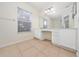Bathroom featuring a large mirror and tile flooring at 2011 Stockton Dr, Sanford, FL 32771
