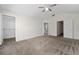 Carpeted bedroom with walk-in closet and ensuite bathroom at 2011 Stockton Dr, Sanford, FL 32771