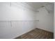 Walk-in closet features shelving for optimal storage at 2011 Stockton Dr, Sanford, FL 32771