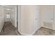 Hallway with carpet and doors at 2011 Stockton Dr, Sanford, FL 32771