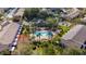 Aerial view of a community pool surrounded by palm trees and well-maintained landscaping at 2011 Stockton Dr, Sanford, FL 32771