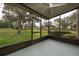 Enjoy the outdoors in this screened-in porch at 2011 Stockton Dr, Sanford, FL 32771