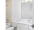 Clean bathroom with single vanity, neutral tile, and bathtub at 2221 Valentine Aly, Orlando, FL 32804