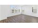 Bright bedroom featuring hardwood floors and large windows at 2221 Valentine Aly, Orlando, FL 32804