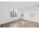 Well-lit bedroom with hardwood floors and multiple windows at 2221 Valentine Aly, Orlando, FL 32804