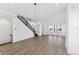 Bright and spacious living room with hardwood floors and modern staircase at 2221 Valentine Aly, Orlando, FL 32804