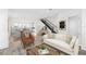 Inviting living room boasts an open layout, stylish furniture, and seamless flow to the kitchen at 2221 Valentine Aly, Orlando, FL 32804