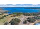 An aerial view of a wooded area with a lake in the background at 2350 Bradbury Rd, Haines City, FL 33844