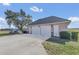 Side view of detached garage and driveway at 2350 Bradbury Rd, Haines City, FL 33844