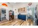 Bright kitchen area with butler pantry, granite countertops, and stainless steel appliances at 2351 Fenton Ave, Clermont, FL 34711