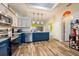 Well-designed kitchen featuring sleek stainless steel appliances, granite countertops, and ample cabinet space at 2351 Fenton Ave, Clermont, FL 34711
