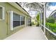 Screened-in patio providing a comfortable transition between indoor and outdoor living at 2351 Fenton Ave, Clermont, FL 34711