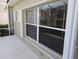 Large picture window with white frame, and exterior access at 2351 Fenton Ave, Clermont, FL 34711