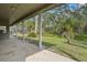 View from the covered lanai overlooking the beautiful tree lined backyard at 293 Saxony Ct, Winter Springs, FL 32708