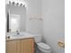 Clean bathroom with a single sink vanity, and toilet, creating a functional space at 293 Saxony Ct, Winter Springs, FL 32708