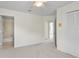 Neutral bedroom with carpet, ceiling fan, and access to the en-suite bathroom at 293 Saxony Ct, Winter Springs, FL 32708