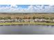 Waterfront backyards with pools and screened enclosures at 2983 Sunset Vista Blvd, Kissimmee, FL 34747