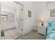 Bedroom with ensuite bathroom and wicker nightstand at 2983 Sunset Vista Blvd, Kissimmee, FL 34747