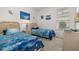 Bedroom with two twin-size beds and ocean decor at 2983 Sunset Vista Blvd, Kissimmee, FL 34747