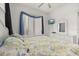 Cozy bedroom with woven furniture, and neutral walls at 2983 Sunset Vista Blvd, Kissimmee, FL 34747