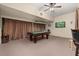 Spacious game room featuring a pool table, bar area and tv, for hours of fun at 2983 Sunset Vista Blvd, Kissimmee, FL 34747