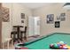 Game room with pool table, dartboard and bar stools at 2983 Sunset Vista Blvd, Kissimmee, FL 34747