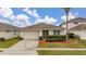 One-story house with attached garage at 2983 Sunset Vista Blvd, Kissimmee, FL 34747