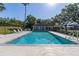 Community pool with lounge chairs and restrooms at 2983 Sunset Vista Blvd, Kissimmee, FL 34747