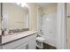 Bathroom featuring a vanity, mirror, faucet, toilet, and a bathtub with a shower head and curtain at 3541 Belland Cir # A, Clermont, FL 34711