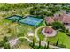 Community amenities include tennis courts, putting green, a gazebo, and lush landscaping at 3541 Belland Cir # A, Clermont, FL 34711