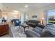 Cozy living room with plush sofas, stylish decor, and an open layout at 3541 Belland Cir # A, Clermont, FL 34711