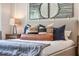Main bedroom with bed, pillows, and nightstand at 3547 Sandalwood Isle Way, Ocoee, FL 34761