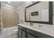 Bathroom features double sinks, bathtub with shower and updated fixtures at 3610 Charmed Ln, St Cloud, FL 34772