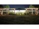 Night shot of the Esprit community sign adorned with holiday lights and deer decorations at 3610 Charmed Ln, St Cloud, FL 34772